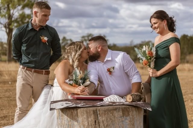Couple signing the register